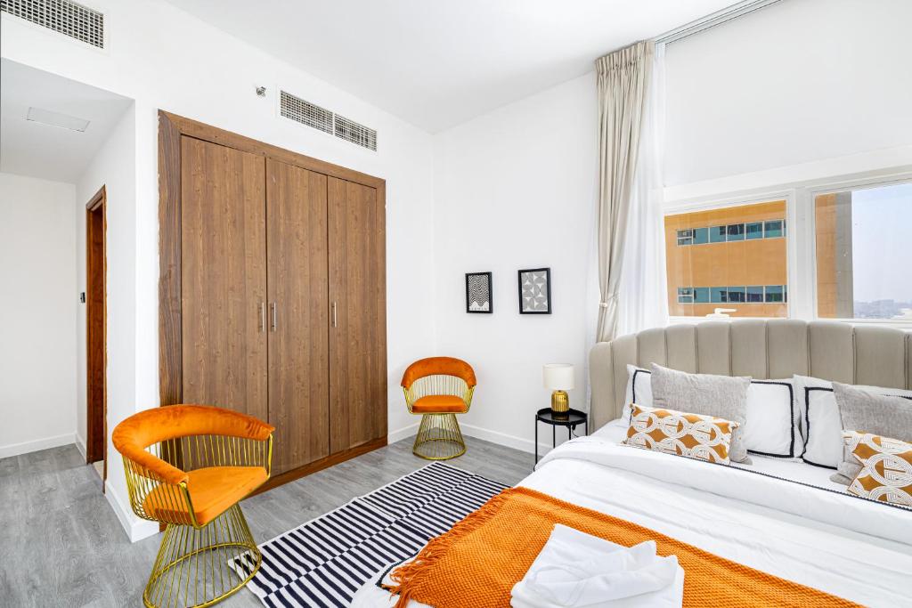 Voodi või voodid majutusasutuse Sleek nordic style seaview condo toas