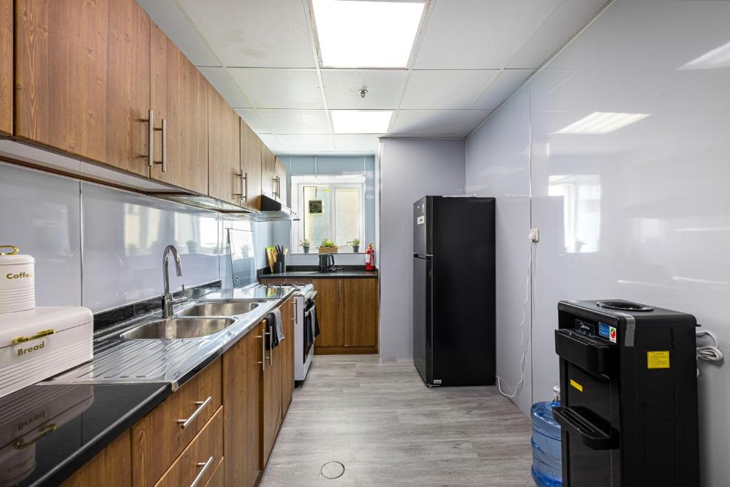 Köök või kööginurk majutusasutuses Sleek nordic style seaview condo