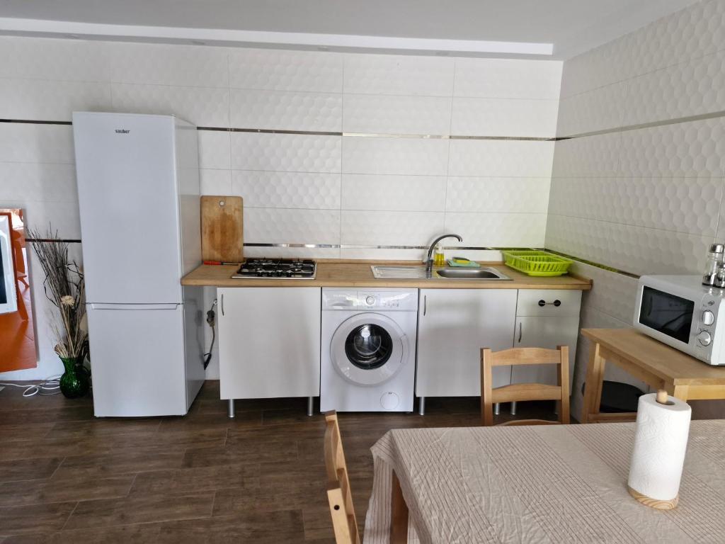 Kuchyň nebo kuchyňský kout v ubytování Las palmeras