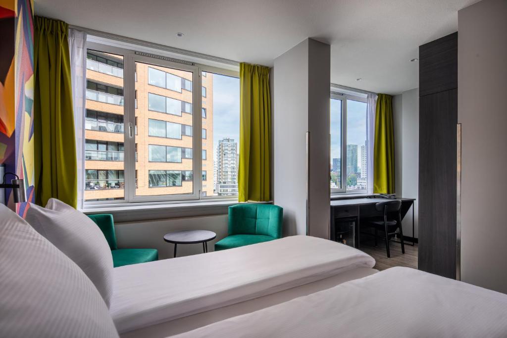 Postel nebo postele na pokoji v ubytování Thon Hotel Rotterdam City Centre