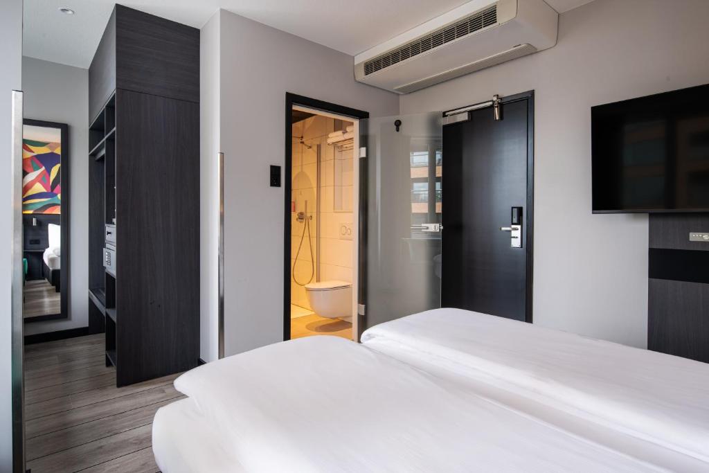 Postel nebo postele na pokoji v ubytování Thon Hotel Rotterdam City Centre