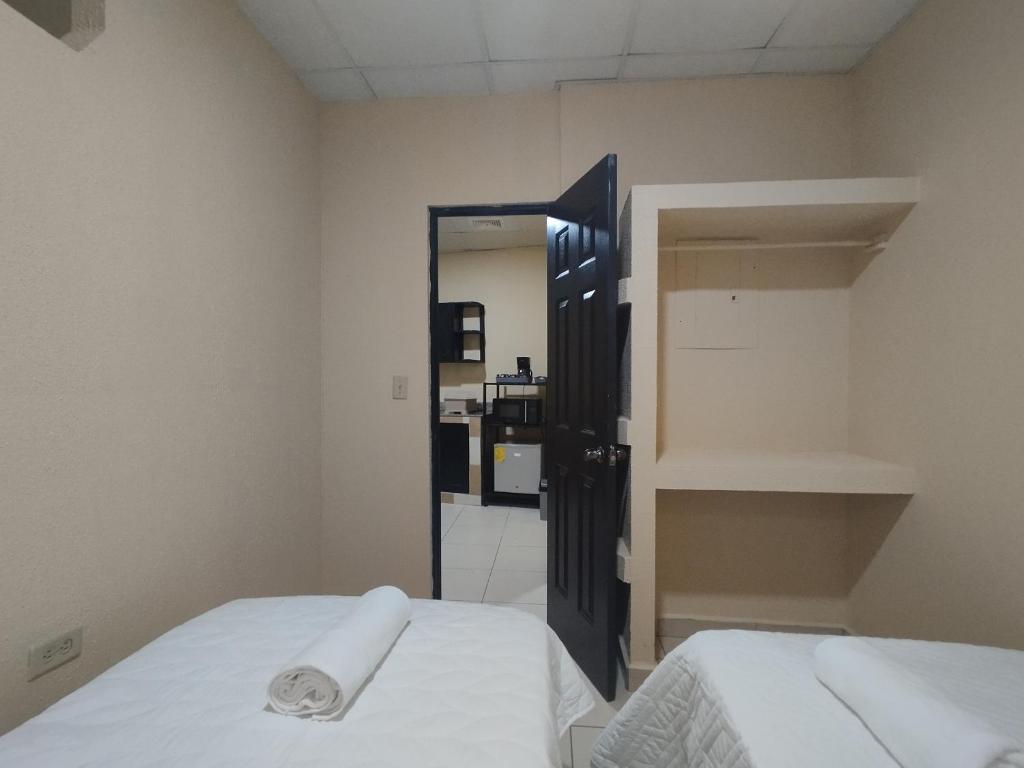 Postel nebo postele na pokoji v ubytování Apartamentos Marconela
