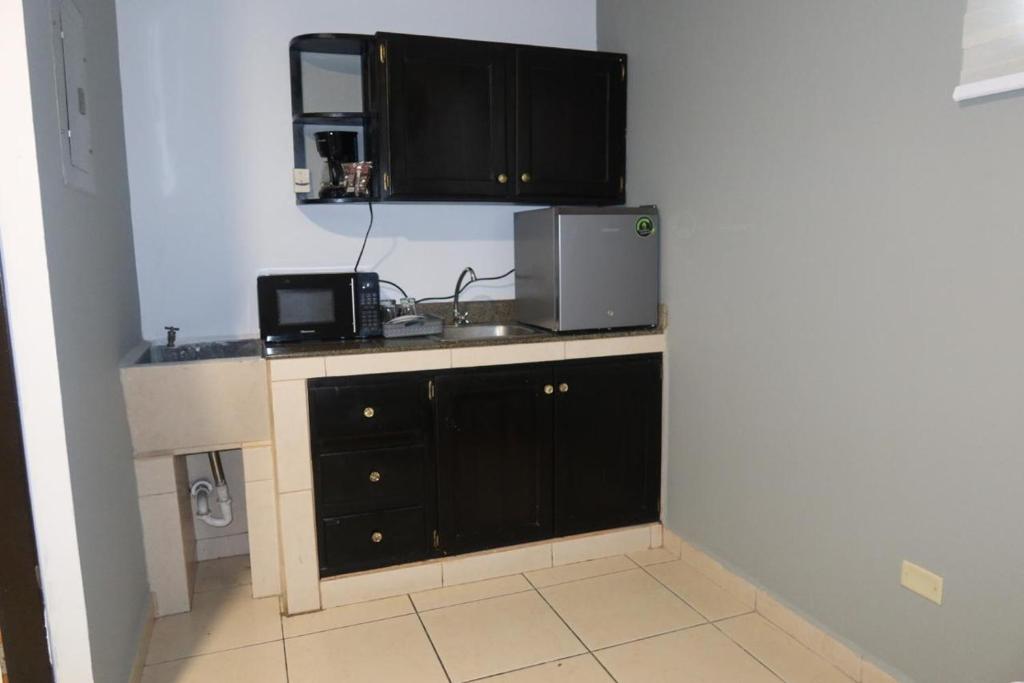 Kuchyň nebo kuchyňský kout v ubytování Apartamentos Marconela