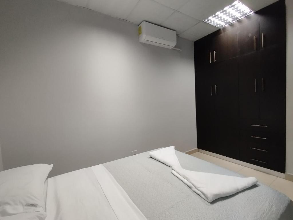 Postel nebo postele na pokoji v ubytování Apartamentos Marconela