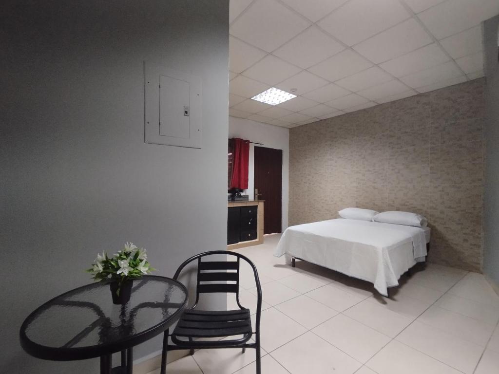 Postel nebo postele na pokoji v ubytování Apartamentos Marconela