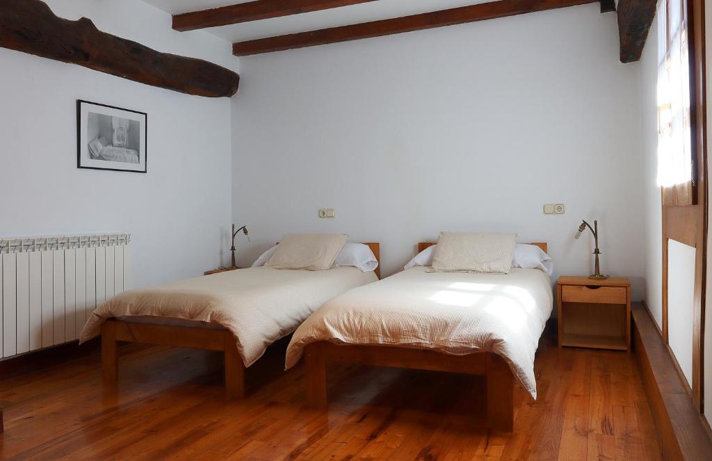 Postel nebo postele na pokoji v ubytování Olatuenea casa rural