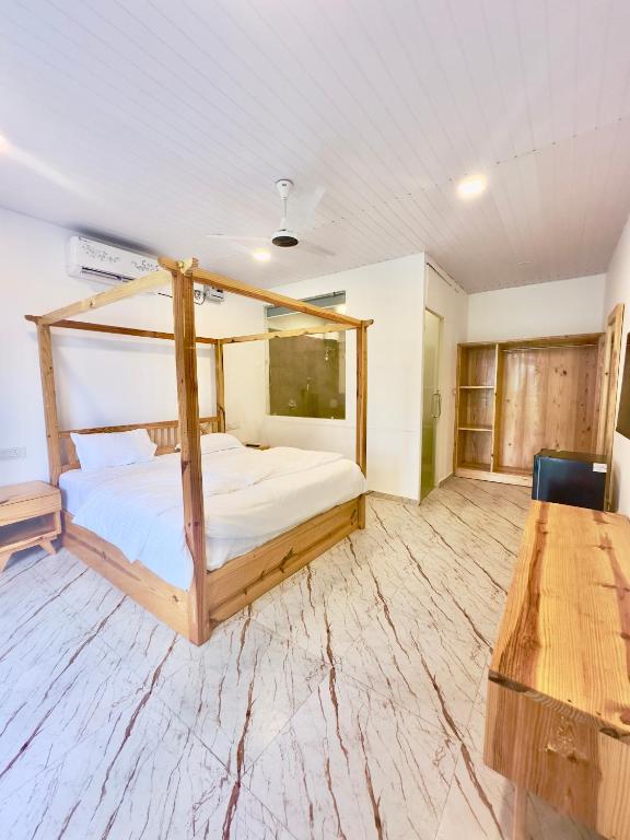 Postel nebo postele na pokoji v ubytování Magic Sand Beach Resort