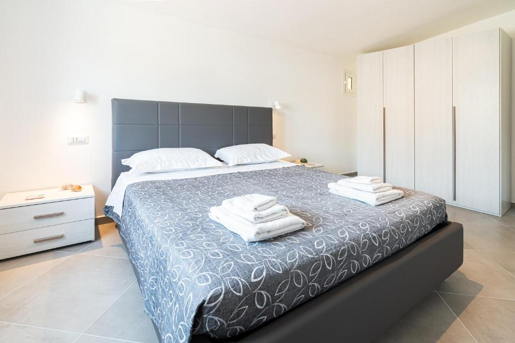 En eller flere senge i et værelse på Casa Di Gregorio - Intero Appartamento