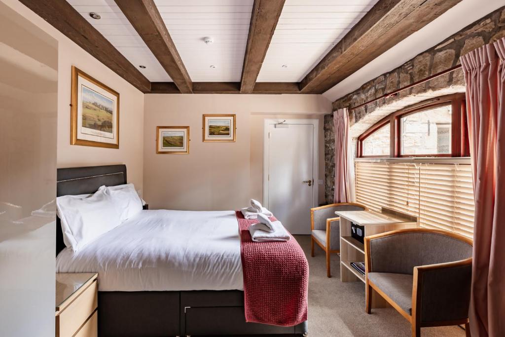 Postel nebo postele na pokoji v ubytování The Inn At Kingsbarns