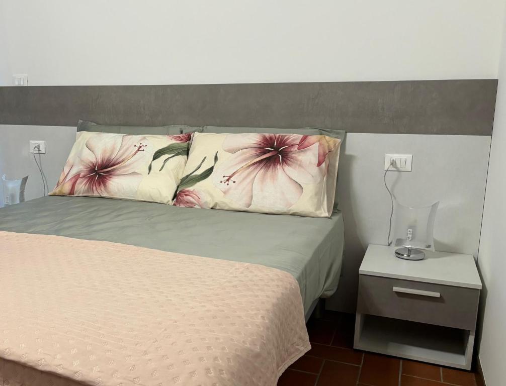 Postel nebo postele na pokoji v ubytování Bed & Breakfast Residenza Cuore
