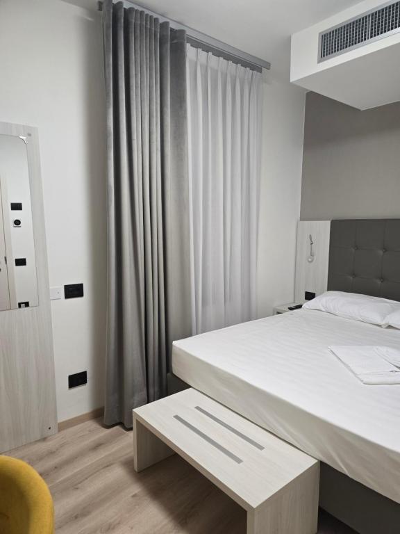 Postel nebo postele na pokoji v ubytování Albergo Al Gambero
