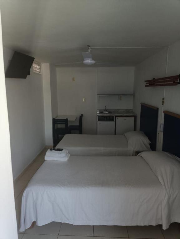 Postel nebo postele na pokoji v ubytování Hotel Vagabundo Expo Guadalajara