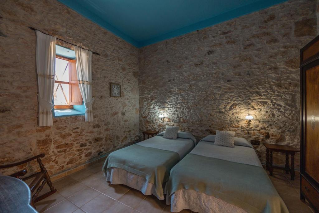 Posteľ alebo postele v izbe v ubytovaní Hotel Rural Era de la Corte - Adults only