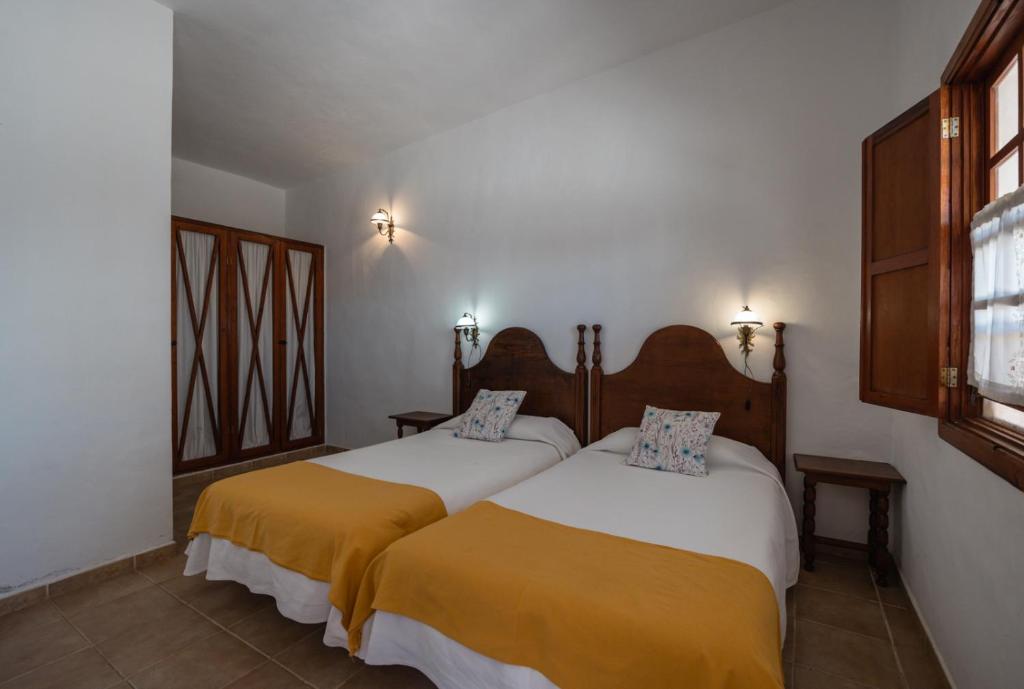 Posteľ alebo postele v izbe v ubytovaní Hotel Rural Era de la Corte - Adults only
