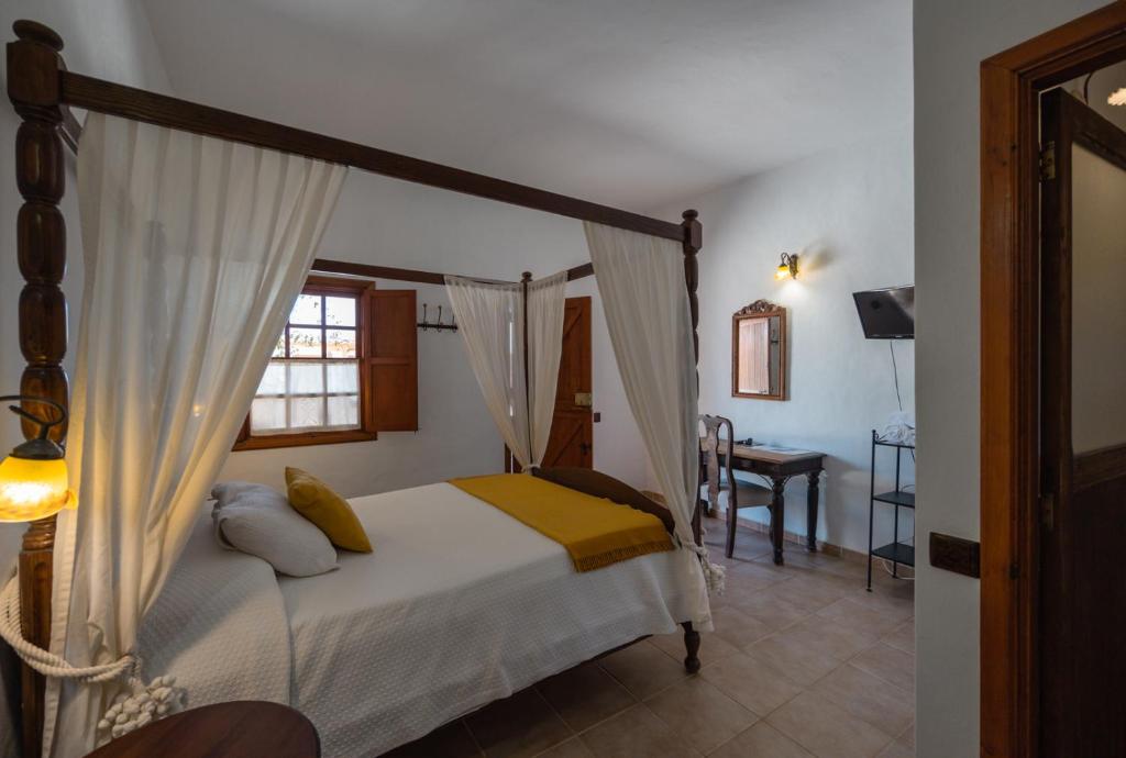 Posteľ alebo postele v izbe v ubytovaní Hotel Rural Era de la Corte - Adults only