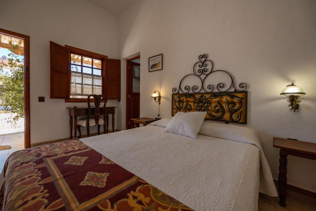 Posteľ alebo postele v izbe v ubytovaní Hotel Rural Era de la Corte - Adults only