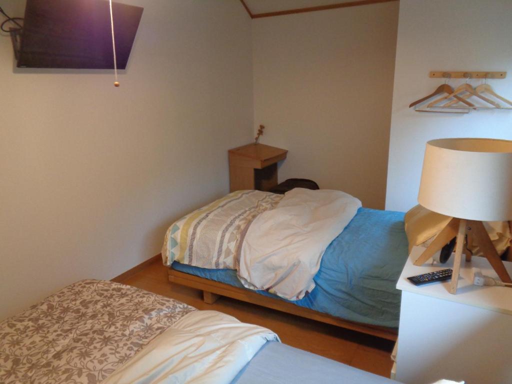 Postel nebo postele na pokoji v ubytování Premium Guest House Alaskan Dream
