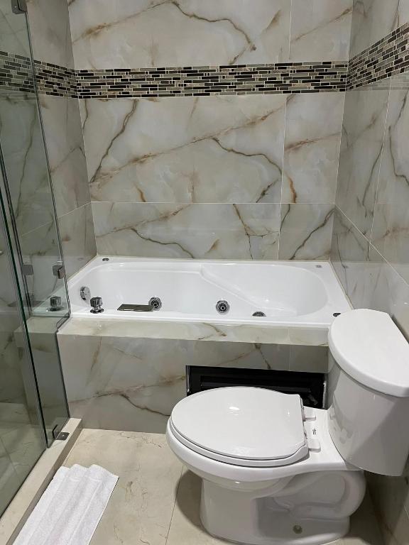 Koupelna v ubytování Hotel Cinco Diamantes