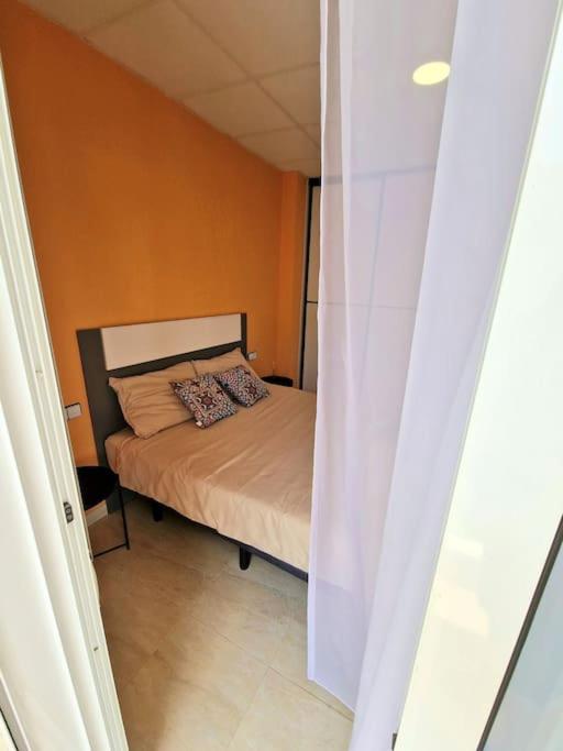 Postelja oz. postelje v sobi nastanitve Apartament Sant Jaume D'enveja