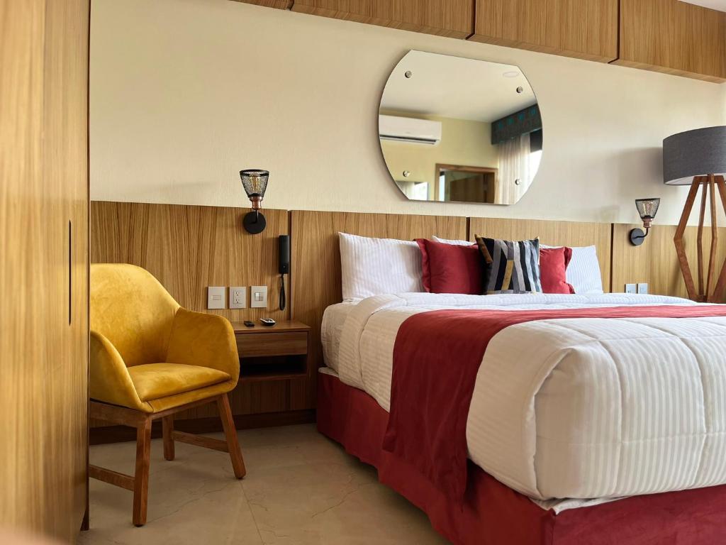 Postel nebo postele na pokoji v ubytování Hotel Cinco Diamantes