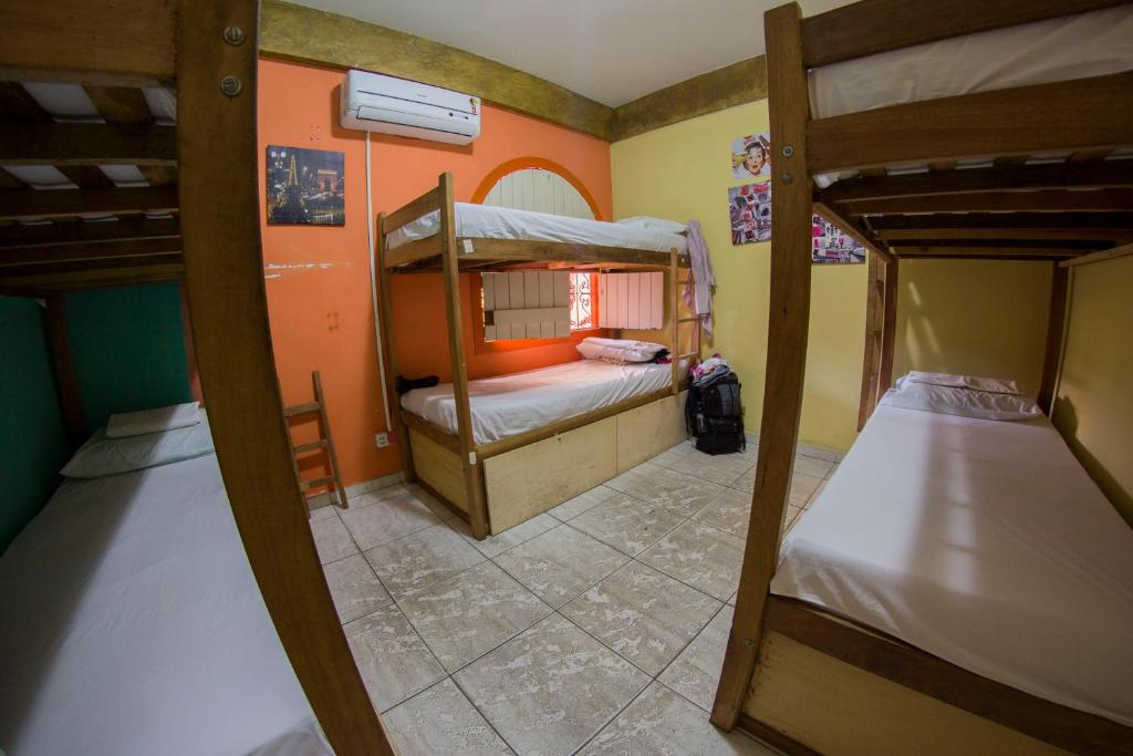 Postel nebo postele na pokoji v ubytování Cosmopolitan Hostel