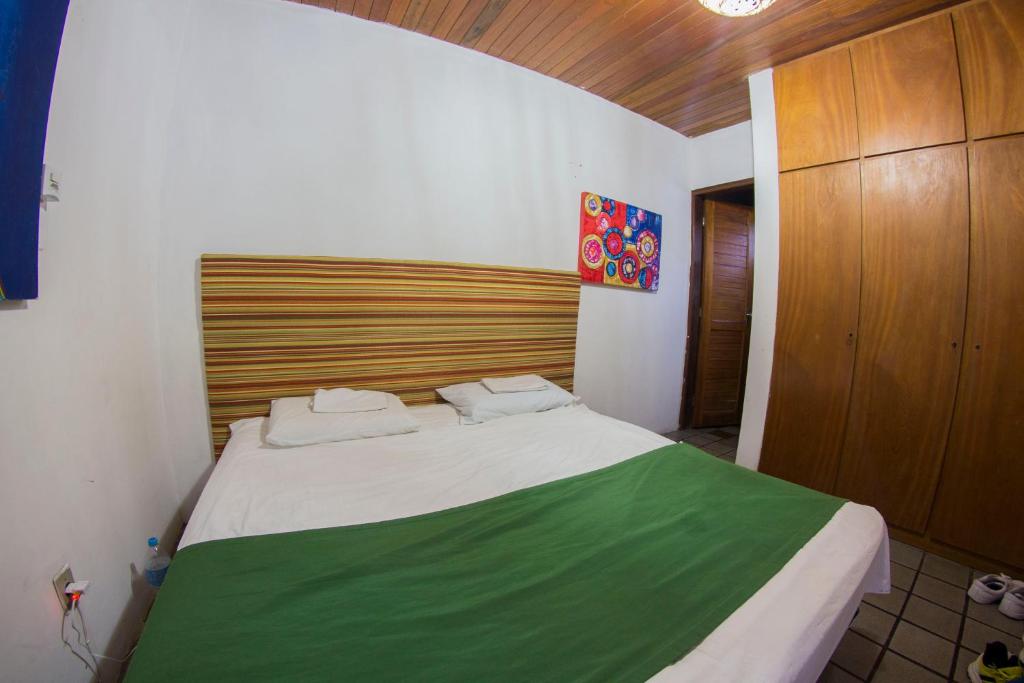 Postel nebo postele na pokoji v ubytování Cosmopolitan Hostel