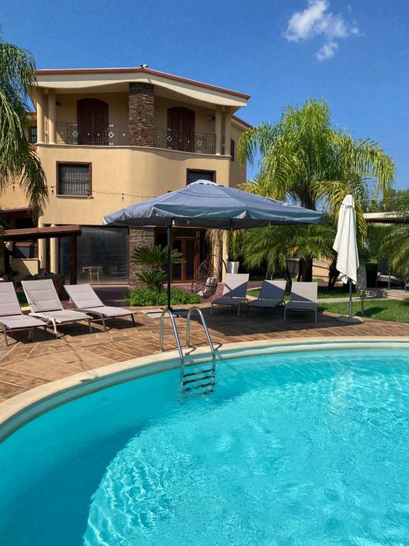 The swimming pool at or close to Villa Grisì