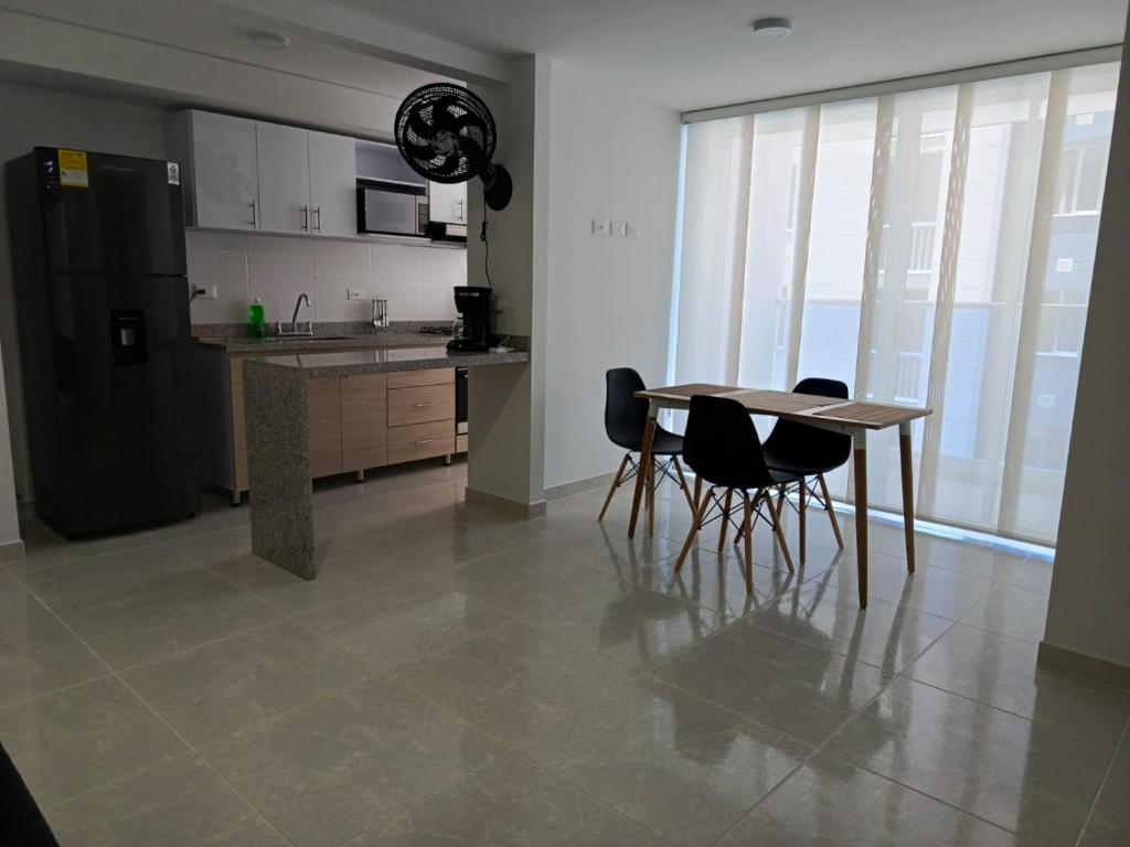 Eldhús eða eldhúskrókur á Apartamentos en Club Residencial