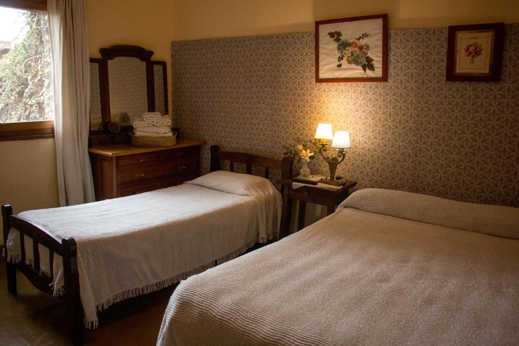 Postel nebo postele na pokoji v ubytování Hostería San Martin