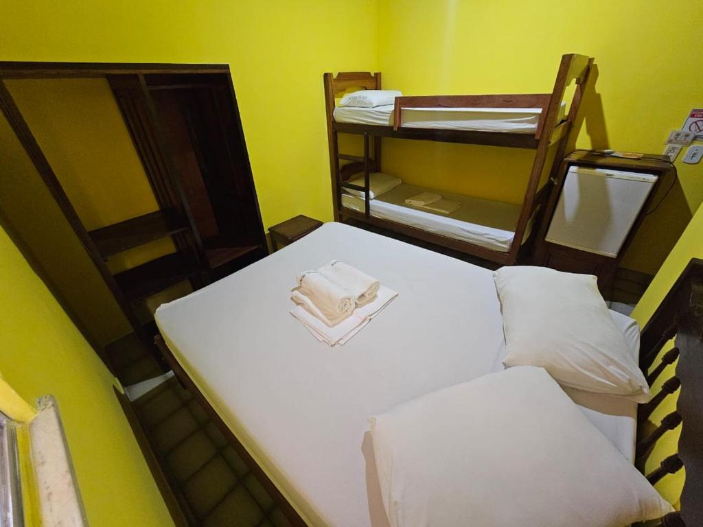 Postel nebo postele na pokoji v ubytování Hostel Beach