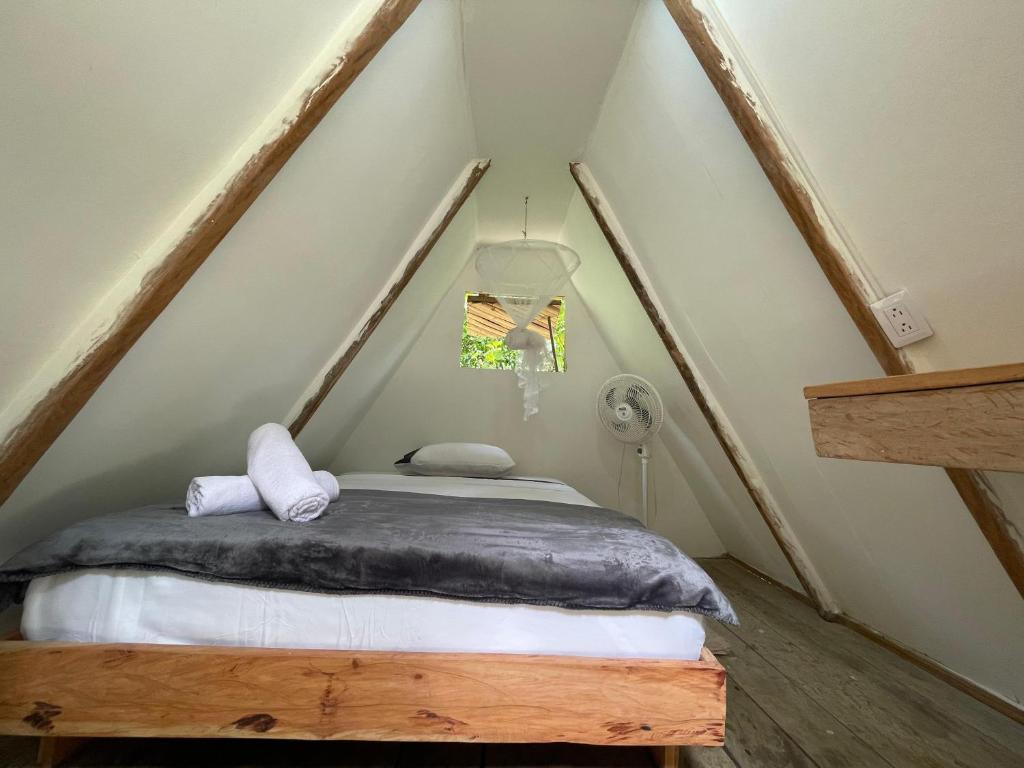 Postel nebo postele na pokoji v ubytování Cascada escondida glamping