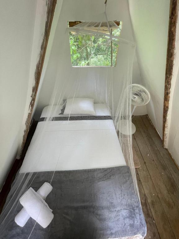 Postel nebo postele na pokoji v ubytování Cascada escondida glamping