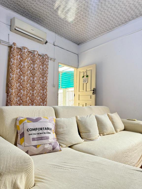 Giường trong phòng chung tại Peaceful 1BR APT in Maculusso