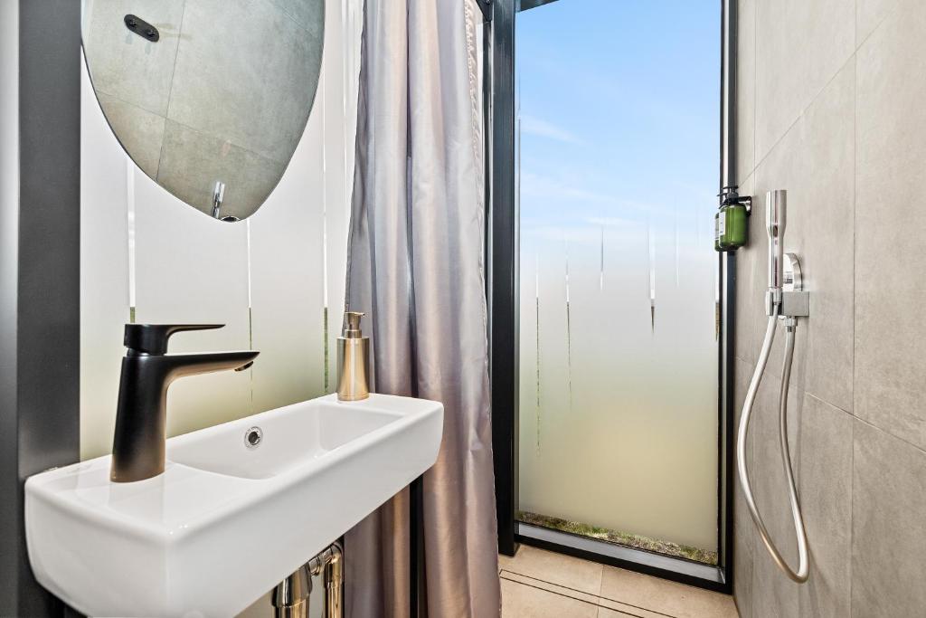 Bilik mandi di Heathland Lodge