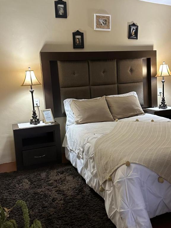 Postel nebo postele na pokoji v ubytování Casa de las Escaleras