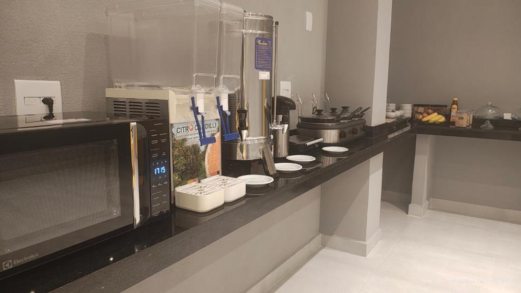 A kitchen or kitchenette at Unity Hotel - Sorocaba