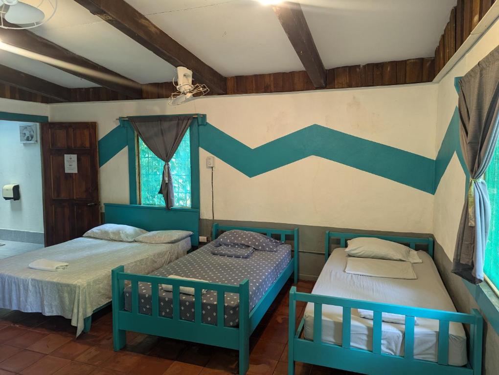 Postel nebo postele na pokoji v ubytování Tasty Dayz Hostel