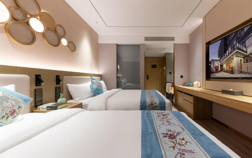 Jingfang Building Smart Hotel - Located in the busiest part of the downtown area, Near Beijing Tiananmen Square and the Forbidden City,Newly opened hotel,Heating is provided during winter,Provide free laundry service,Provide tourism and ticketing services - Deluxe Twin Room