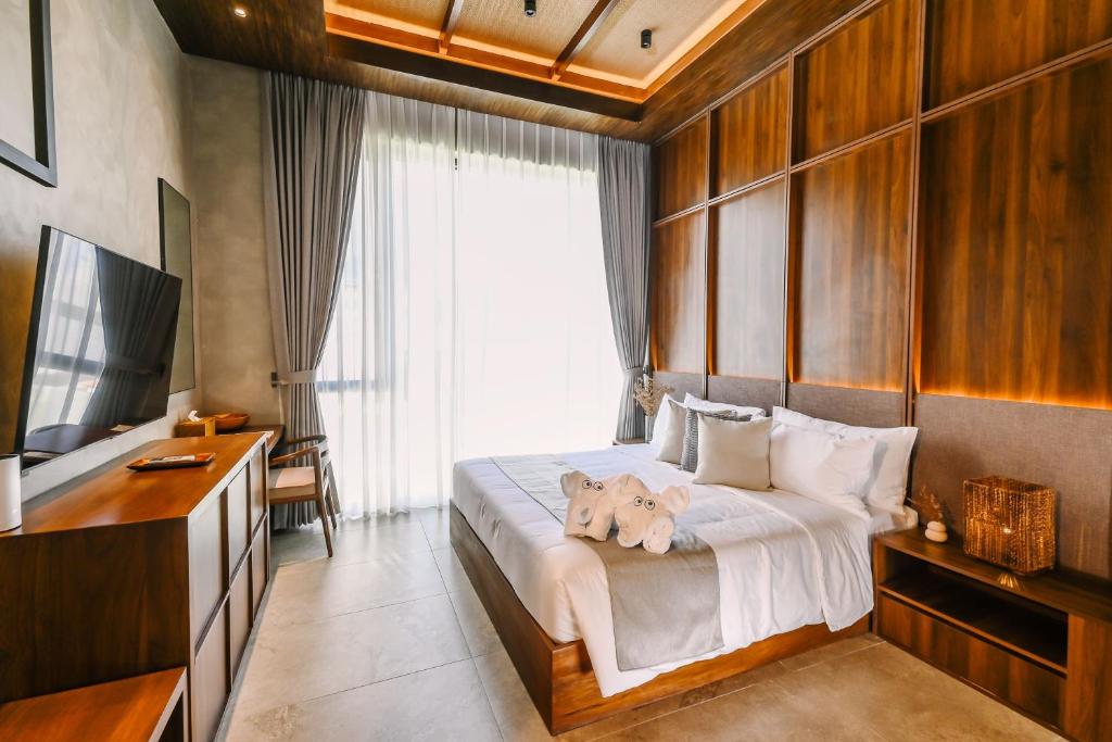 TV a/nebo společenská místnost v ubytování TANA Beach Villas