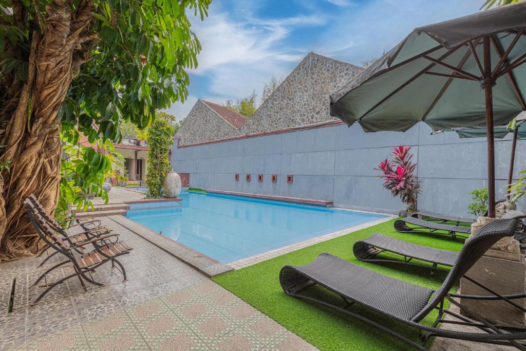 Bazén v ubytování Pondok Gajah Hotel nebo v jeho okolí