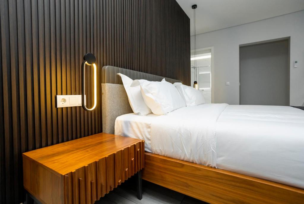 Postel nebo postele na pokoji v ubytování Space Quality Apart Hotel
