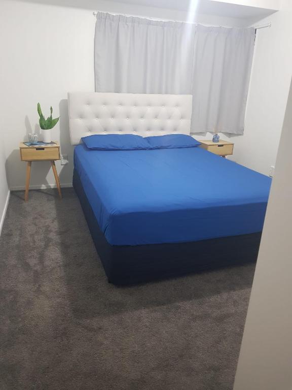 Postel nebo postele na pokoji v ubytování Manukau Room Accommodation