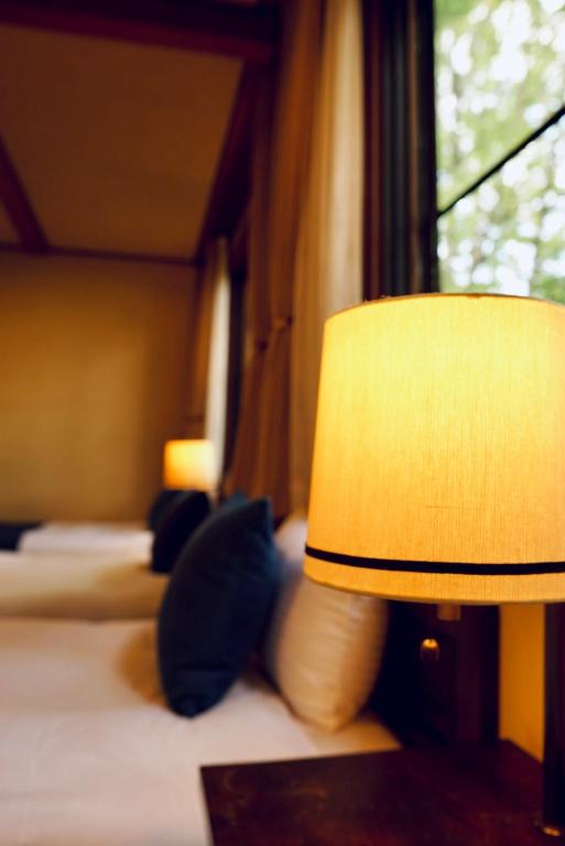 Postel nebo postele na pokoji v ubytování Hotel Wohnen