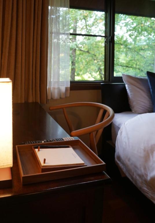 Postel nebo postele na pokoji v ubytování Hotel Wohnen