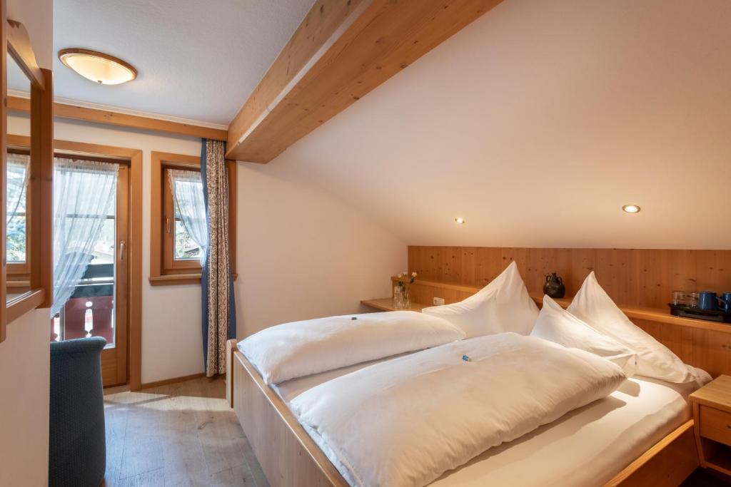 Posteľ alebo postele v izbe v ubytovaní Landhaus Kaiserblick