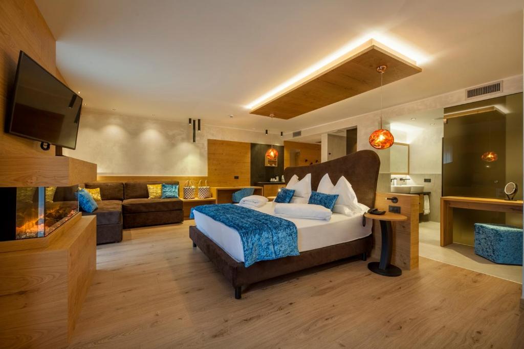 TV a/nebo společenská místnost v ubytování Adler Hotel Wellness & Spa - Andalo