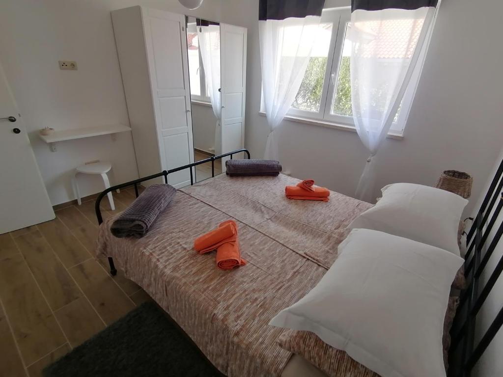 Postel nebo postele na pokoji v ubytování House FIDULIĆ - apartment RUSTIC