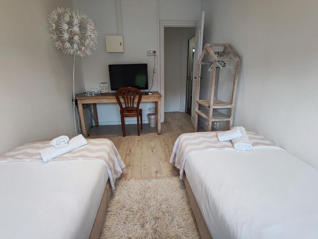 Postel nebo postele na pokoji v ubytování MOODz HOTEL VIENNE