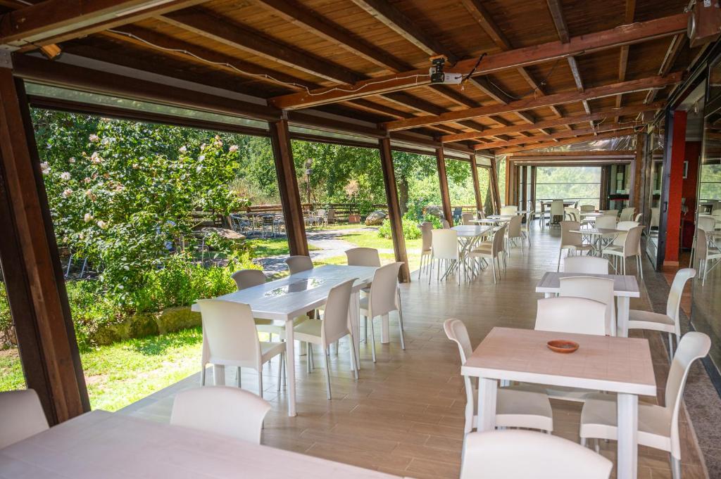 Restaurace v ubytování Villaggio Le Querce
