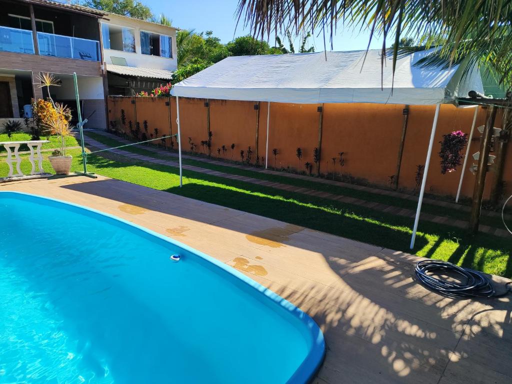 Πισίνα στο ή κοντά στο Casa para Temporadas e Eventos